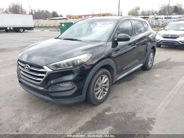 KM8J33A49HU584557 2017 HYUNDAI TUCSON - Image 2