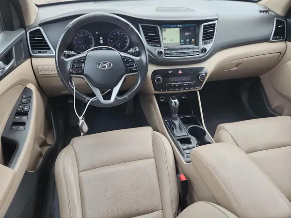 KM8J3CA20GU035603 2016 HYUNDAI TUCSON - Image 7