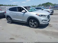 KM8J3CA20HU285764 2017 HYUNDAI TUCSON