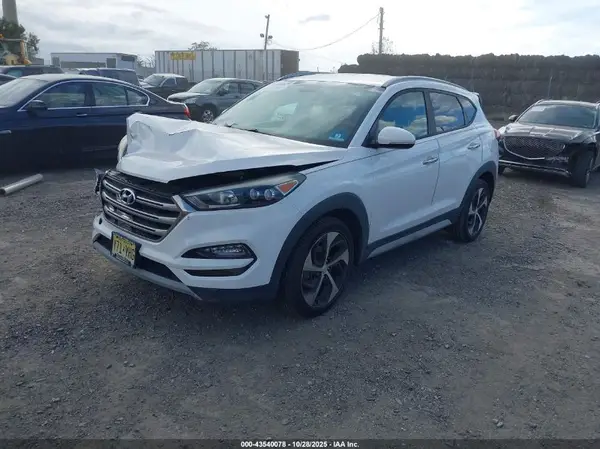 KM8J3CA20HU410813 2017 HYUNDAI TUCSON - Image 2