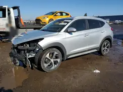 KM8J3CA20HU582811 2017 HYUNDAI TUCSON