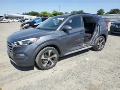 KM8J3CA20JU778026 2018 HYUNDAI TUCSON