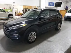 KM8J3CA21GU025498 2016 HYUNDAI TUCSON