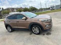 KM8J3CA21GU048585 2016 HYUNDAI TUCSON