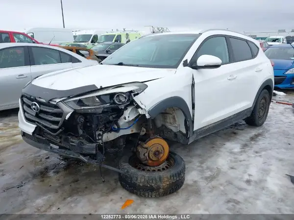 KM8J3CA21GU077794 2016 HYUNDAI TUCSON - Image 2