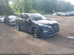 KM8J3CA21GU119963 2016 HYUNDAI TUCSON