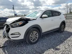 KM8J3CA21GU225880 2016 HYUNDAI TUCSON