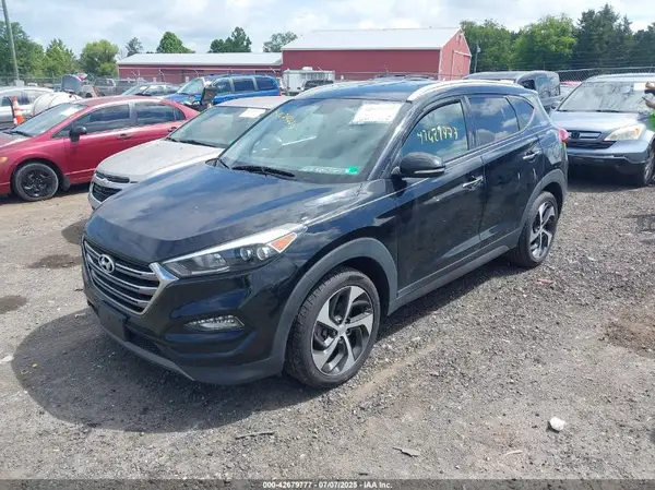 KM8J3CA21GU237558 2016 HYUNDAI TUCSON - Image 2