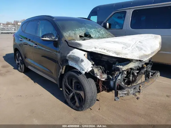 KM8J3CA21HU281884 2017 HYUNDAI TUCSON - Image 1