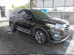 KM8J3CA21HU327424 2017 HYUNDAI TUCSON