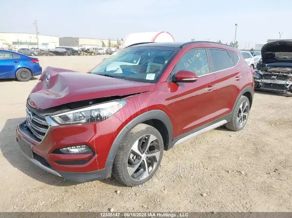 KM8J3CA21JU815570 2018 HYUNDAI TUCSON - Image 2