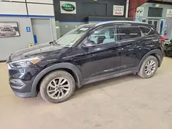 KM8J3CA22GU043878 2016 HYUNDAI TUCSON