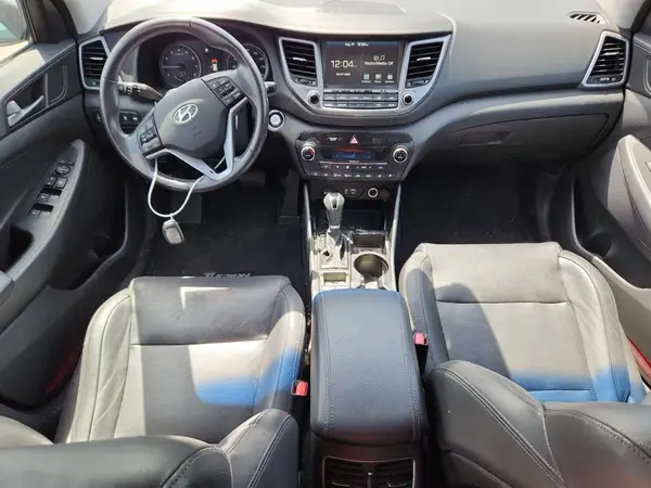 KM8J3CA22GU201104 2016 HYUNDAI TUCSON - Image 8