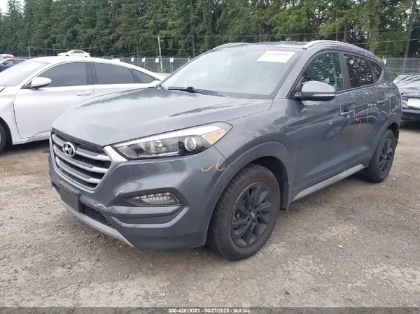 KM8J3CA22HU523100 2017 HYUNDAI TUCSON - Image 2
