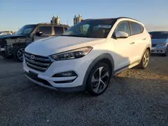 KM8J3CA22HU596757 2017 HYUNDAI TUCSON