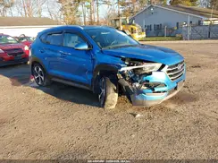KM8J3CA23GU056977 2016 HYUNDAI TUCSON