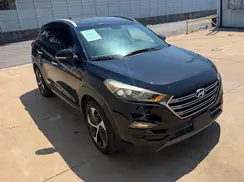 KM8J3CA23GU106907 2016 HYUNDAI TUCSON