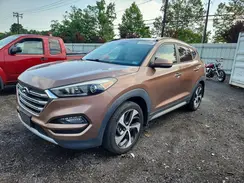 KM8J3CA23HU297102 2017 HYUNDAI TUCSON