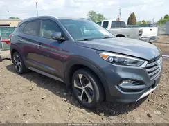 KM8J3CA23HU338053 2017 HYUNDAI TUCSON