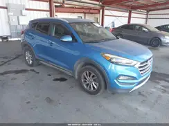 KM8J3CA23HU340594 2017 HYUNDAI TUCSON