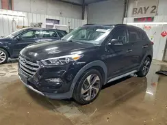 KM8J3CA23JU784046 2018 HYUNDAI TUCSON