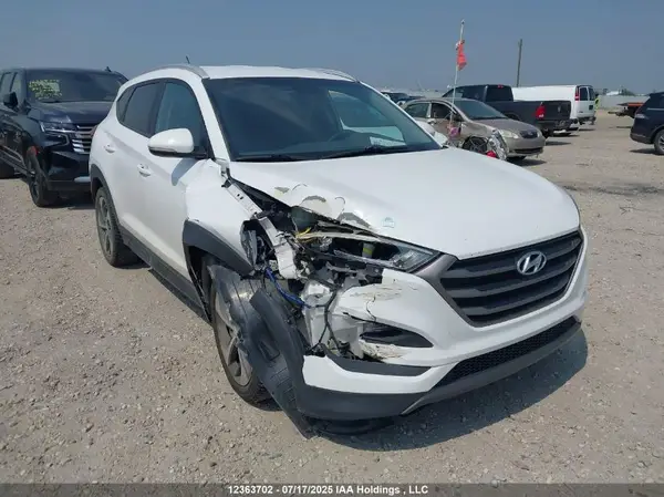 KM8J3CA24GU091818 2016 HYUNDAI TUCSON - Image 1