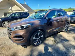 KM8J3CA24GU111422 2016 HYUNDAI TUCSON