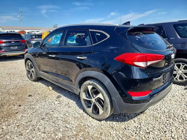 KM8J3CA24GU145960 2016 HYUNDAI TUCSON - Image 2