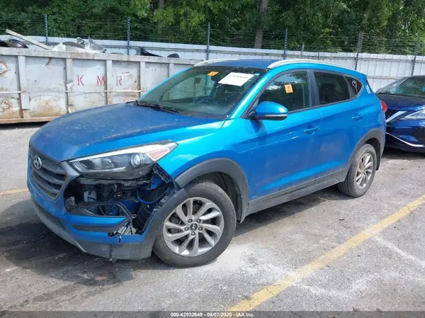 KM8J3CA24GU213044 2016 HYUNDAI TUCSON - Image 2
