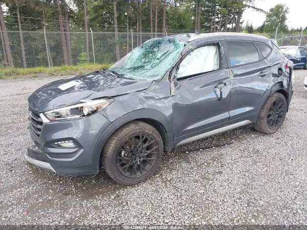 KM8J3CA24HU311332 2017 HYUNDAI TUCSON - Image 2