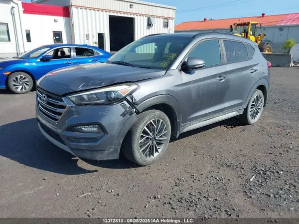 KM8J3CA24HU325652 2017 HYUNDAI TUCSON - Image 2