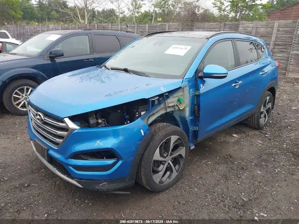 KM8J3CA24HU375290 2017 HYUNDAI TUCSON - Image 2