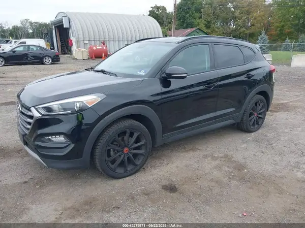 KM8J3CA24HU451395 2017 HYUNDAI TUCSON - Image 2