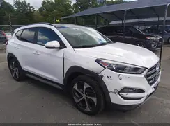 KM8J3CA24JU725619 2018 HYUNDAI TUCSON