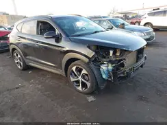 KM8J3CA25GU023138 2016 HYUNDAI TUCSON