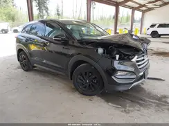 KM8J3CA25GU045804 2016 HYUNDAI TUCSON