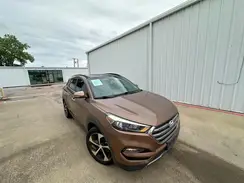 KM8J3CA25GU049075 2016 HYUNDAI TUCSON
