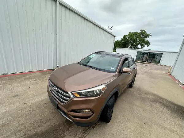 KM8J3CA25GU049075 2016 HYUNDAI TUCSON - Image 2