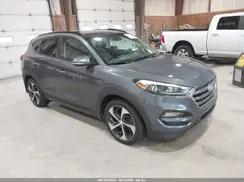 KM8J3CA25GU058570 2016 HYUNDAI TUCSON