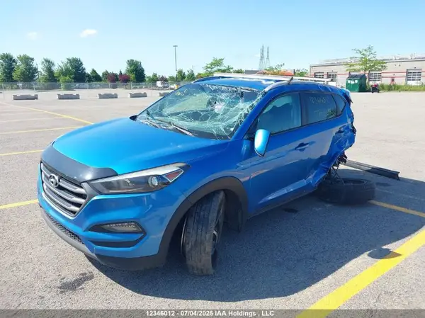 KM8J3CA25GU076504 2016 HYUNDAI TUCSON - Image 2