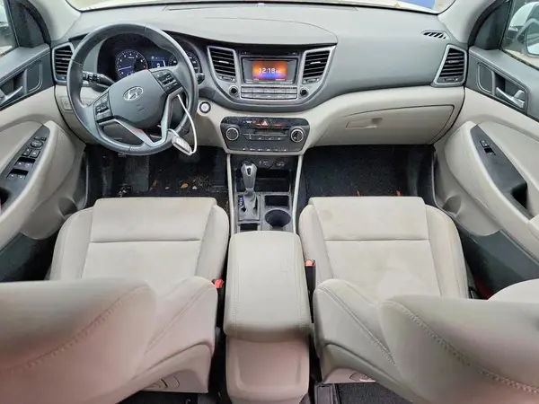 KM8J3CA25GU102311 2016 HYUNDAI TUCSON - Image 8