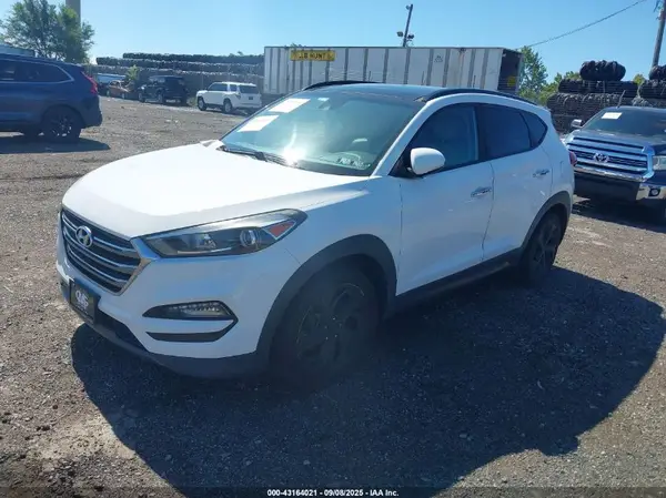 KM8J3CA25GU142839 2016 HYUNDAI TUCSON - Image 2
