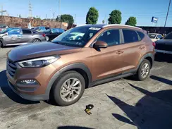 KM8J3CA25GU159799 2016 HYUNDAI TUCSON
