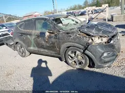 KM8J3CA25GU172522 2016 HYUNDAI TUCSON