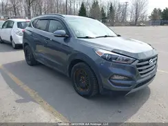 KM8J3CA25GU182788 2016 HYUNDAI TUCSON