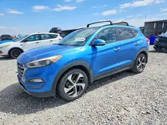 KM8J3CA25GU209228 2016 HYUNDAI TUCSON