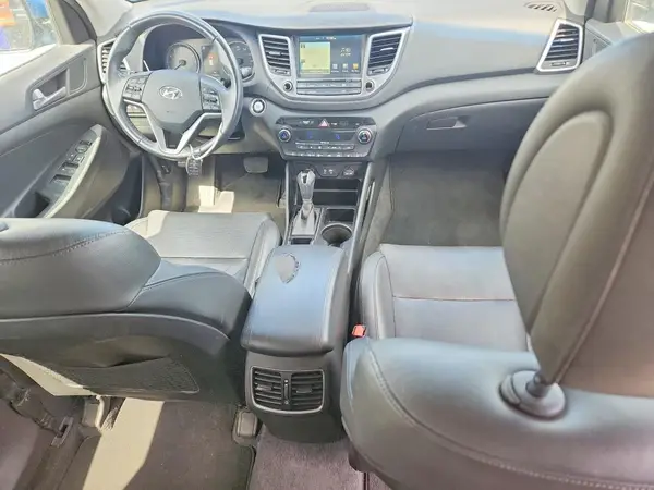 KM8J3CA25GU209228 2016 HYUNDAI TUCSON - Image 8