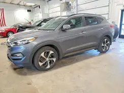 KM8J3CA25GU222268 2016 HYUNDAI TUCSON