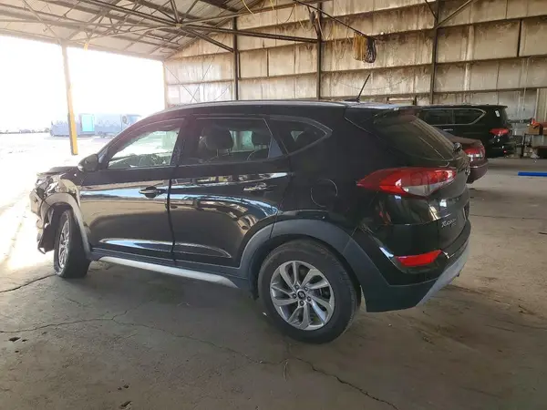 KM8J3CA25HU290880 2017 HYUNDAI TUCSON - Image 2