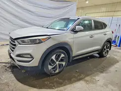 KM8J3CA25HU296338 2017 HYUNDAI TUCSON